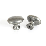 This is an image showing From The Anvil - Pewter Oval Cabinet Knob available from T.H Wiggans Architectural Ironmongery in Kendal, quick delivery and discounted prices