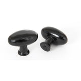 This is an image showing From The Anvil - Black Oval Cabinet Knob available from T.H Wiggans Architectural Ironmongery in Kendal, quick delivery and discounted prices