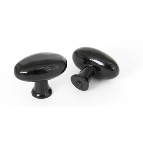 This is an image showing From The Anvil - Black Oval Cabinet Knob available from T.H Wiggans Architectural Ironmongery in Kendal, quick delivery and discounted prices