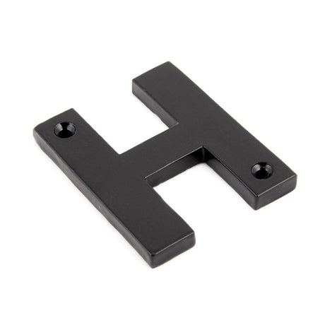 This is an image of From The Anvil - Black Letter H available to order from T.H Wiggans Architectural Ironmongery in Kendal, quick delivery and discounted prices.