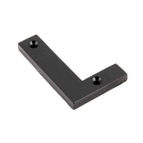 This is an image of From The Anvil - Black Letter L available to order from T.H Wiggans Architectural Ironmongery in Kendal, quick delivery and discounted prices.