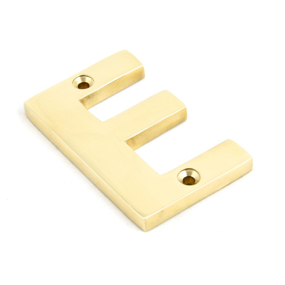 This is an image of From The Anvil - Polished Brass Letter E available to order from T.H Wiggans Architectural Ironmongery in Kendal, quick delivery and discounted prices.