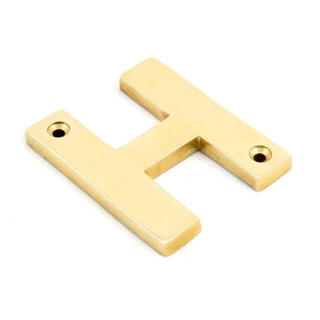 This is an image of From The Anvil - Polished Brass Letter H available to order from T.H Wiggans Architectural Ironmongery in Kendal, quick delivery and discounted prices.