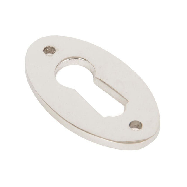 This is an image of From The Anvil - Polished Nickel Oval Escutcheon available to order from T.H Wiggans Architectural Ironmongery in Kendal, quick delivery and discounted prices.