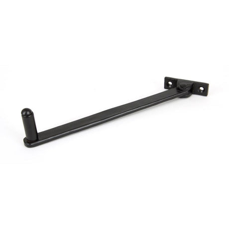 This is an image showing From The Anvil - Black 8" Roller Arm Stay available from T.H Wiggans Architectural Ironmongery in Kendal, quick delivery and discounted prices