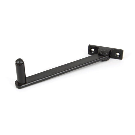 This is an image showing From The Anvil - Black 6" Roller Arm Stay available from T.H Wiggans Architectural Ironmongery in Kendal, quick delivery and discounted prices