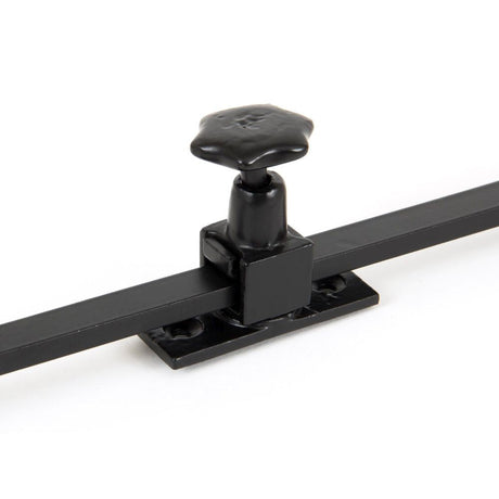 This is an image showing From The Anvil - Black 12" Sliding Stay available from T.H Wiggans Architectural Ironmongery in Kendal, quick delivery and discounted prices