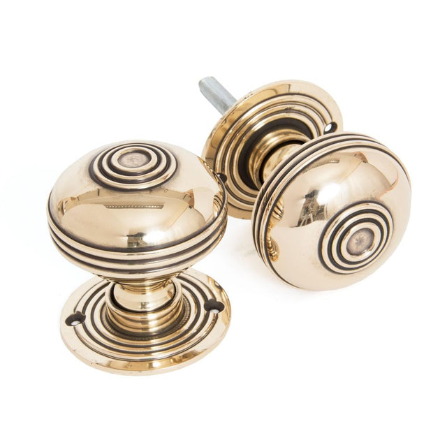 This is an image of From The Anvil - Aged Brass 63mm Prestbury Mortice/Rim Knob Set available to order from T.H Wiggans Architectural Ironmongery in Kendal, quick delivery and discounted prices.