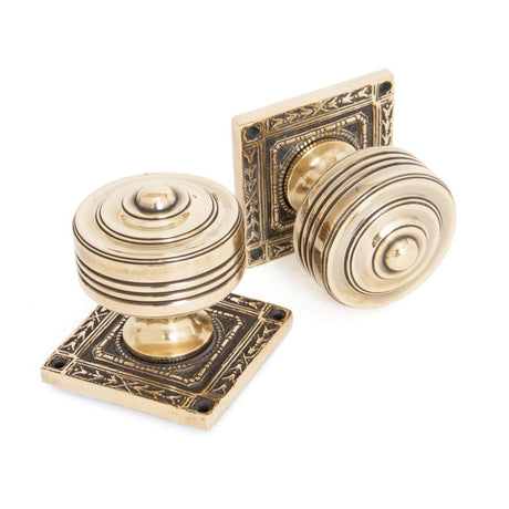 This is an image of From The Anvil - Aged Brass Tewkesbury Square Mortice Knob Set available to order from T.H Wiggans Architectural Ironmongery in Kendal, quick delivery and discounted prices.