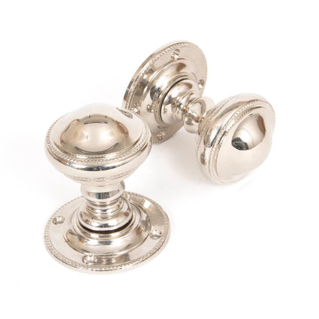 This is an image of From The Anvil - Polished Nickel Brockworth Mortice Knob Set available to order from T.H Wiggans Architectural Ironmongery in Kendal, quick delivery and discounted prices.