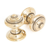 This is an image of From The Anvil - Aged Brass Elmore Concealed Mortice Knob Set available to order from T.H Wiggans Architectural Ironmongery in Kendal, quick delivery and discounted prices.