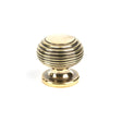 This is an image showing From The Anvil - Aged Brass Beehive Cabinet Knob 30mm available from T.H Wiggans Architectural Ironmongery in Kendal, quick delivery and discounted prices