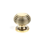 This is an image showing From The Anvil - Aged Brass Beehive Cabinet Knob 30mm available from T.H Wiggans Architectural Ironmongery in Kendal, quick delivery and discounted prices