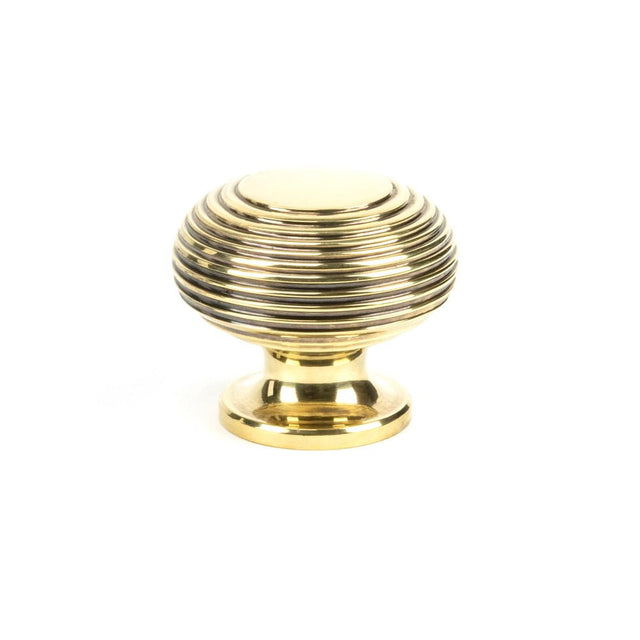 This is an image showing From The Anvil - Aged Brass Beehive Cabinet Knob 40mm available from T.H Wiggans Architectural Ironmongery in Kendal, quick delivery and discounted prices