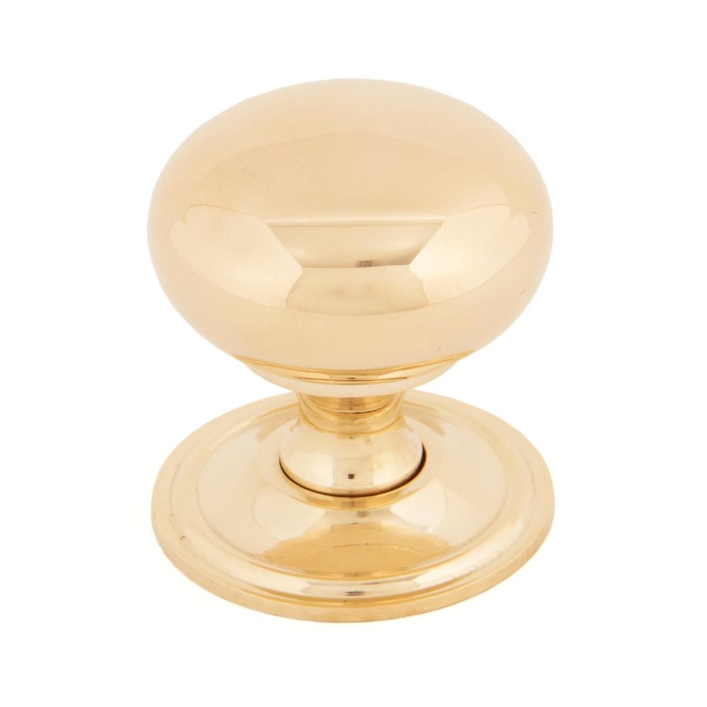 This is an image showing From The Anvil - Polished Brass Mushroom Cabinet Knob 38mm available from T.H Wiggans Architectural Ironmongery in Kendal, quick delivery and discounted prices