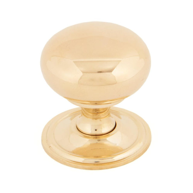 This is an image showing From The Anvil - Polished Brass Mushroom Cabinet Knob 38mm available from T.H Wiggans Architectural Ironmongery in Kendal, quick delivery and discounted prices