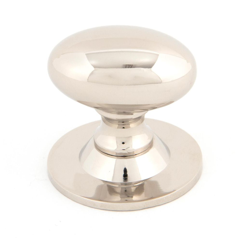 This is an image showing From The Anvil - Polished Nickel Oval Cabinet Knob 40mm available from T.H Wiggans Architectural Ironmongery in Kendal, quick delivery and discounted prices