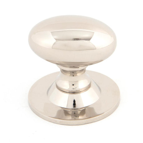This is an image showing From The Anvil - Polished Nickel Oval Cabinet Knob 40mm available from T.H Wiggans Architectural Ironmongery in Kendal, quick delivery and discounted prices