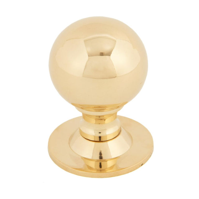 This is an image showing From The Anvil - Polished Brass Ball Cabinet Knob 39mm available from T.H Wiggans Architectural Ironmongery in Kendal, quick delivery and discounted prices