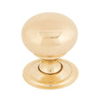 This is an image showing From The Anvil - Polished Brass Mushroom Cabinet Knob 32mm available from T.H Wiggans Architectural Ironmongery in Kendal, quick delivery and discounted prices