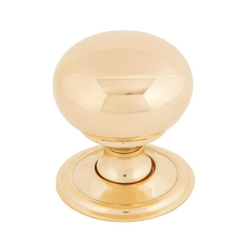 This is an image showing From The Anvil - Polished Brass Mushroom Cabinet Knob 32mm available from T.H Wiggans Architectural Ironmongery in Kendal, quick delivery and discounted prices