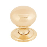 This is an image showing From The Anvil - Polished Brass Mushroom Cabinet Knob 32mm available from T.H Wiggans Architectural Ironmongery in Kendal, quick delivery and discounted prices