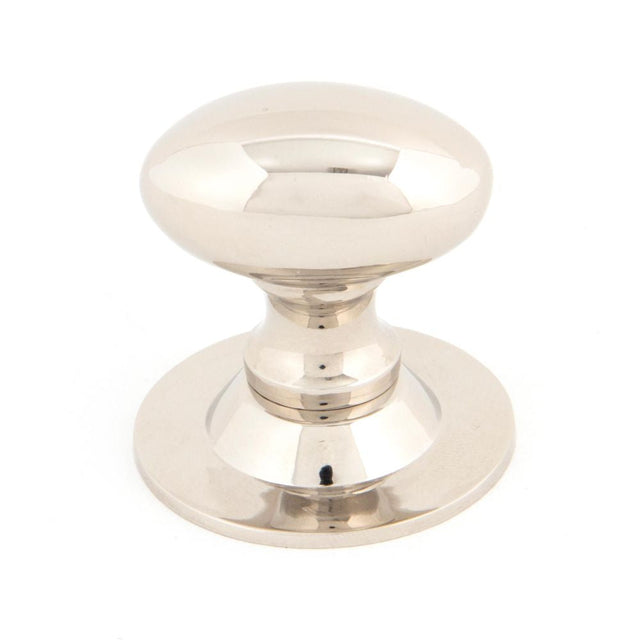 This is an image showing From The Anvil - Polished Nickel Oval Cabinet Knob 33mm available from T.H Wiggans Architectural Ironmongery in Kendal, quick delivery and discounted prices