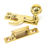 This is an image showing From The Anvil - Polished Brass Prestbury Sash Hook Fastener available from T.H Wiggans Architectural Ironmongery in Kendal, quick delivery and discounted prices