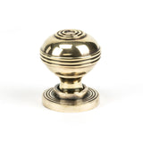 This is an image showing From The Anvil - Aged Brass Prestbury Cabinet Knob 32mm available from T.H Wiggans Architectural Ironmongery in Kendal, quick delivery and discounted prices