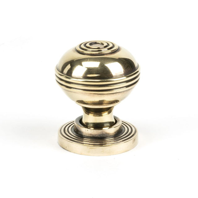 This is an image showing From The Anvil - Aged Brass Prestbury Cabinet Knob 32mm available from T.H Wiggans Architectural Ironmongery in Kendal, quick delivery and discounted prices