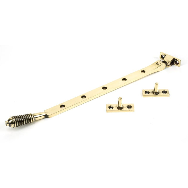 This is an image showing From The Anvil - Aged Brass 12" Reeded Stay available from T.H Wiggans Architectural Ironmongery in Kendal, quick delivery and discounted prices