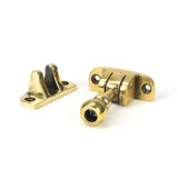 This is an image showing From The Anvil - Aged Brass Mushroom Brighton Fastener (Radiused) available from T.H Wiggans Architectural Ironmongery in Kendal, quick delivery and discounted prices