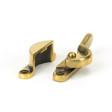 This is an image showing From The Anvil - Aged Brass Fitch Fastener available from T.H Wiggans Architectural Ironmongery in Kendal, quick delivery and discounted prices