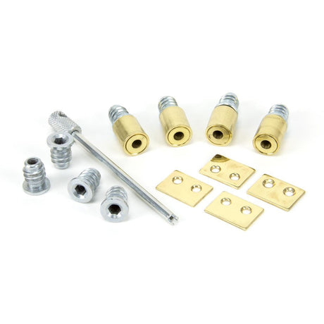 This is an image showing From The Anvil - Lacquered Brass Secure Stops (Pack of 4) available from T.H Wiggans Architectural Ironmongery in Kendal, quick delivery and discounted prices