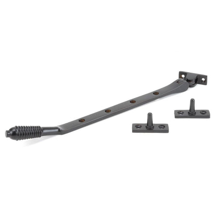 This is an image showing From The Anvil - Aged Bronze 10" Reeded Stay available from T.H Wiggans Architectural Ironmongery in Kendal, quick delivery and discounted prices