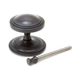 This is an image showing From The Anvil - Aged Bronze Art Deco Centre Door Knob available from trade door handles, quick delivery and discounted prices