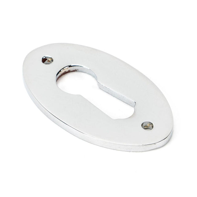 This is an image of From The Anvil - Polished Chrome Oval Escutcheon available to order from T.H Wiggans Architectural Ironmongery in Kendal, quick delivery and discounted prices.