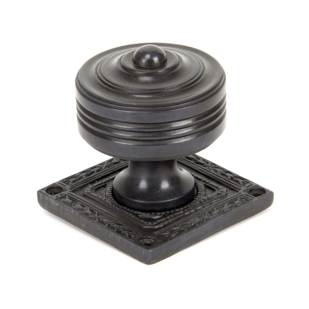 This is an image showing From The Anvil - Aged Bronze Tewkesbury Square Mortice Knob Set available from trade door handles, quick delivery and discounted prices