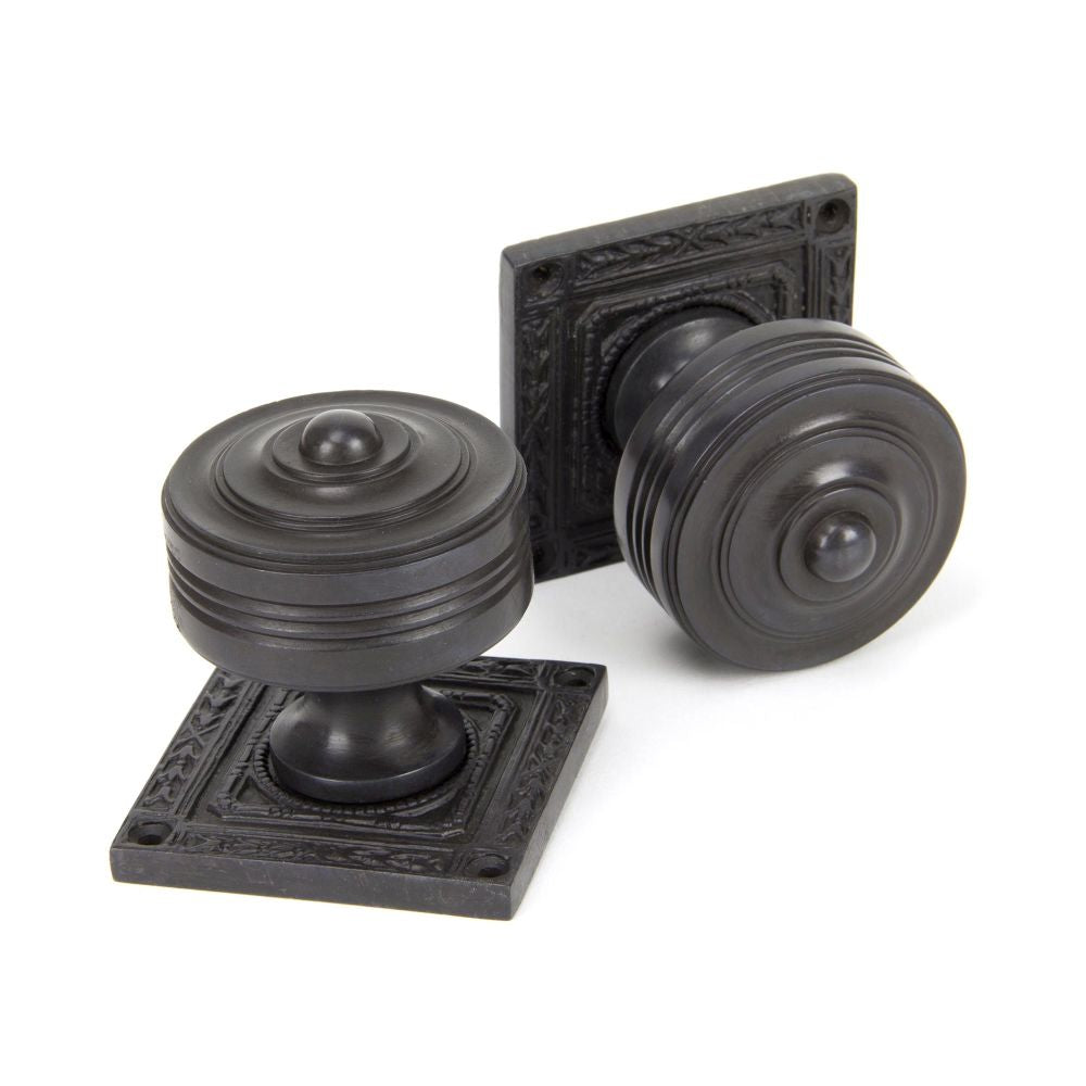 This is an image of From The Anvil - Aged Bronze Tewkesbury Square Mortice Knob Set available to order from T.H Wiggans Architectural Ironmongery in Kendal, quick delivery and discounted prices.