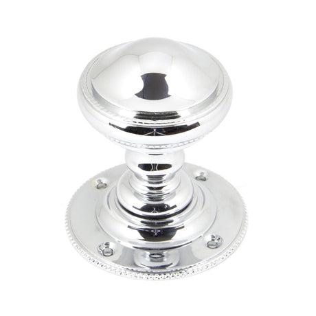 This is an image showing From The Anvil - Polished Chrome Brockworth Mortice Knob Set available from trade door handles, quick delivery and discounted prices