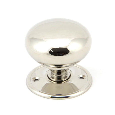 This is an image showing From The Anvil - Polished Nickel 57mm Mushroom Mortice/Rim Knob Set available from trade door handles, quick delivery and discounted prices