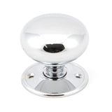 This is an image showing From The Anvil - Polished Chrome 57mm Mushroom Mortice/Rim Knob Set available from trade door handles, quick delivery and discounted prices