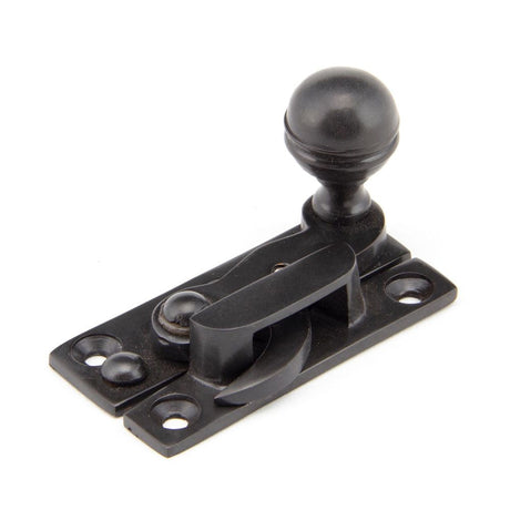 This is an image showing From The Anvil - Aged Bronze Prestbury Sash Hook Fastener available from T.H Wiggans Architectural Ironmongery in Kendal, quick delivery and discounted prices