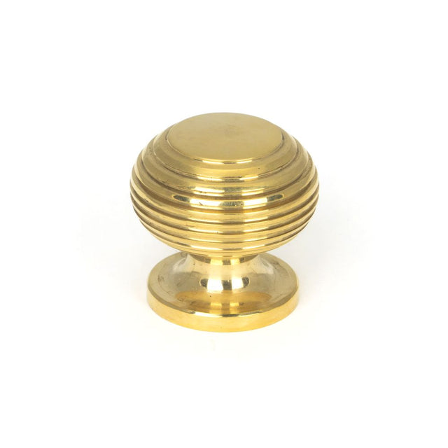 This is an image showing From The Anvil - Polished Brass Beehive Cabinet Knob 30mm available from T.H Wiggans Architectural Ironmongery in Kendal, quick delivery and discounted prices