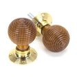 This is an image of From The Anvil - Rosewood & Polished Brass Beehive Mortice/Rim Knob Set available to order from T.H Wiggans Architectural Ironmongery in Kendal, quick delivery and discounted prices.