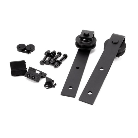 This is an image of From The Anvil - Black Door Hanging Set for Sliding Door Kit available to order from T.H Wiggans Architectural Ironmongery in Kendal, quick delivery and discounted prices.