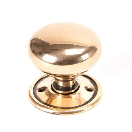 This is an image showing From The Anvil - Polished Bronze Mushroom Mortice/Rim Knob Set available from trade door handles, quick delivery and discounted prices