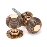 This is an image of From The Anvil - Polished Bronze Heavy Beehive Mortice/Rim Knob Set available to order from T.H Wiggans Architectural Ironmongery in Kendal, quick delivery and discounted prices.