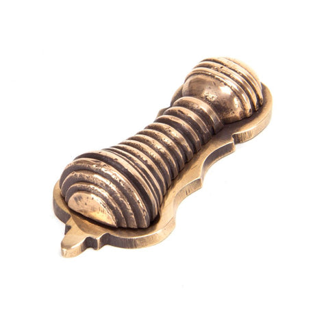 This is an image showing From The Anvil - Polished Bronze Beehive Escutcheon available from trade door handles, quick delivery and discounted prices