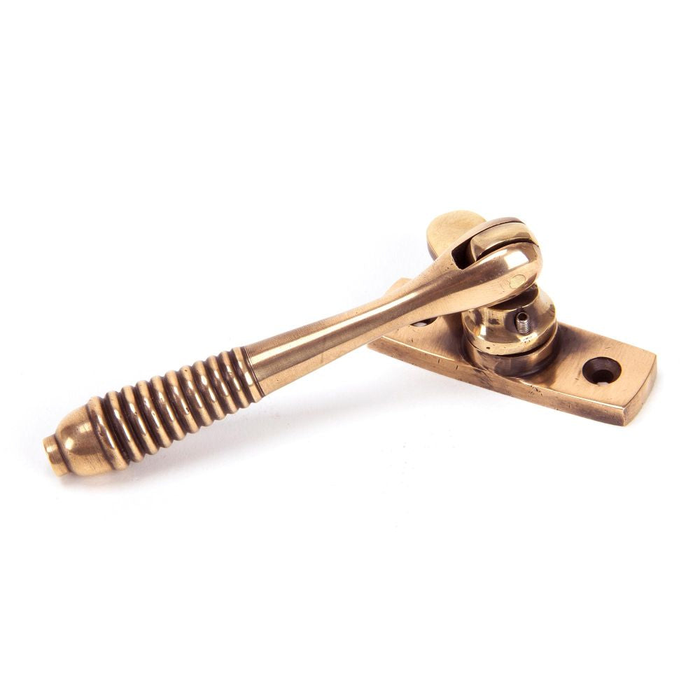 This is an image showing From The Anvil - Polished Bronze Locking Reeded Fastener available from T.H Wiggans Architectural Ironmongery in Kendal, quick delivery and discounted prices